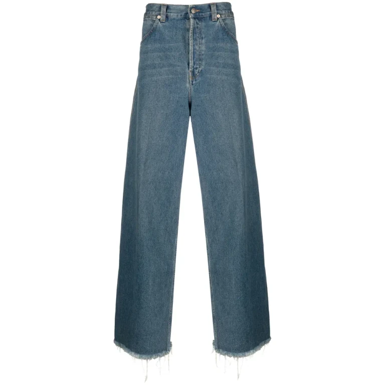 Jeans Gucci a gamba larga con orlo a taglio vivo