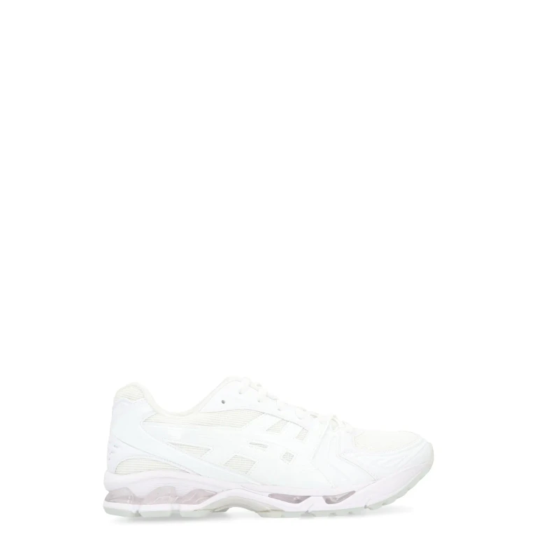 Comme des Garçons Shirt Low-top Sneakers Made Of Leather And Fabric.