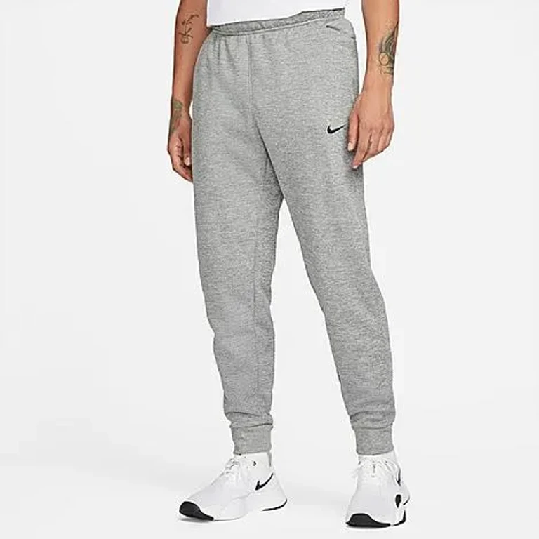 Nike Men's Therma-FIT Tapered Fitness Sweatpants in Charcoal Heather/Dark Smoke Grey/Black Size: Small