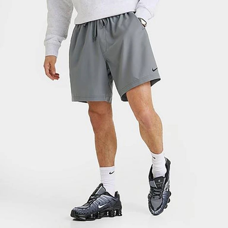 Nike Men's Form Dri-FIT Unlined 7" Versatile Shorts in Smoke Grey/Black Size: XS