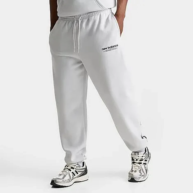 New Balance Men's Athletics Fleece Cuffed Jogger Pants in Grey/Back Size: Small