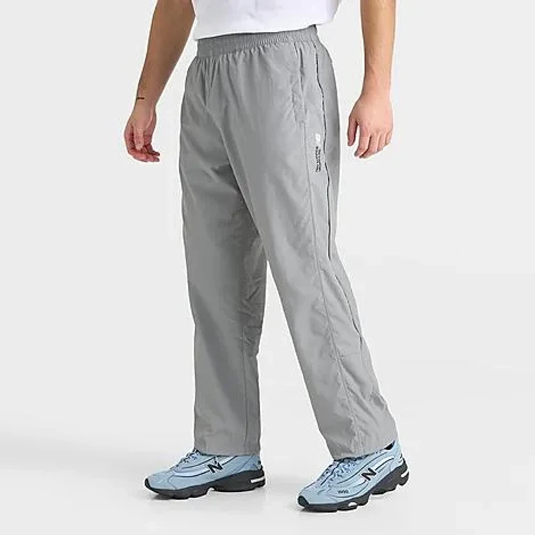 New Balance Men's Vision Woven Track Pants in Black/Reflective Size: Small