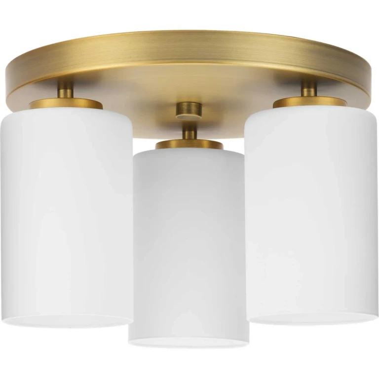 Vintage Brass Three Light Flush Mount from the Cofield Collection