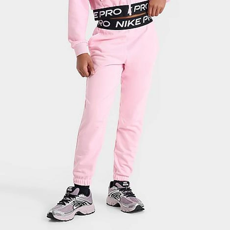 Nike Girls' Big Kids Pro Fleece Dri-FIT Jogger Pants in Medium Soft Pink/Medium Soft Pink/Black Size: Small