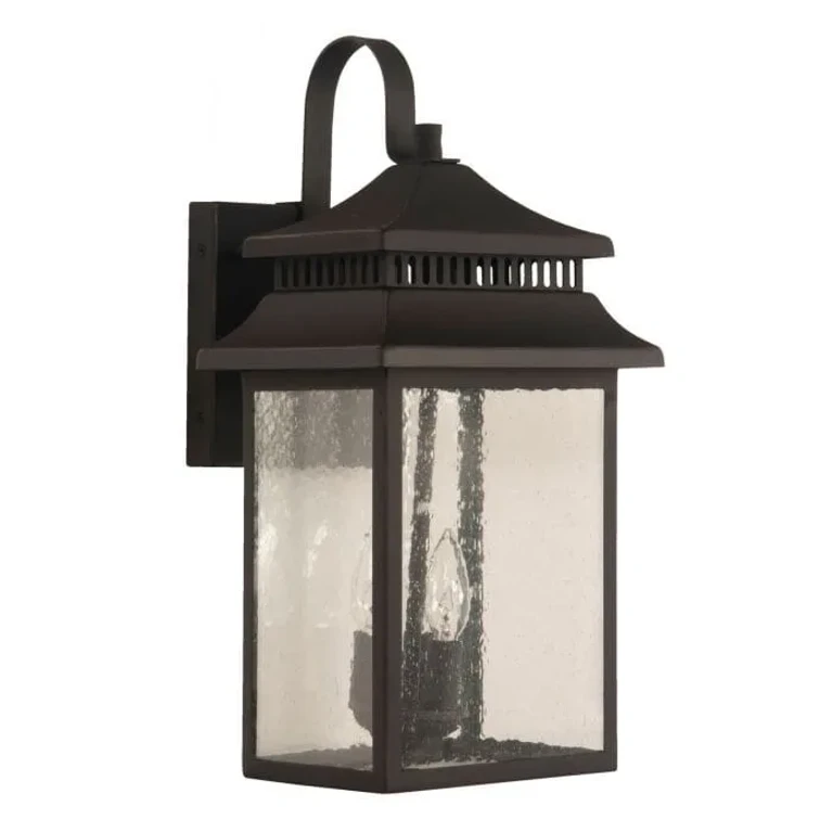 Dark Bronze Gilded Three Light Outdoor Wall Mount from the Crossbend Collection