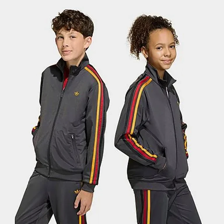adidas Big Kids Originals Firebird Loose Track Top in Utility Black/Collegiate Gold Size: XS