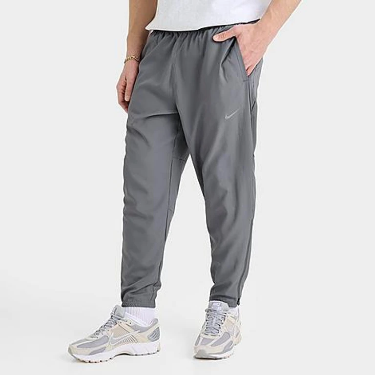 Nike Men's Challenger Dri-FIT Woven Running Pants in Smoke Grey/Black Size: XS