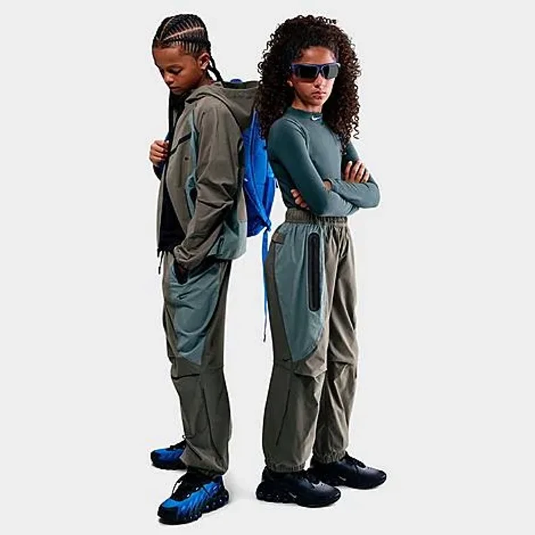 Nike Big Kids Tech Woven Jogger Pants in Cave Stone/Cool Grey/Black Size: XS