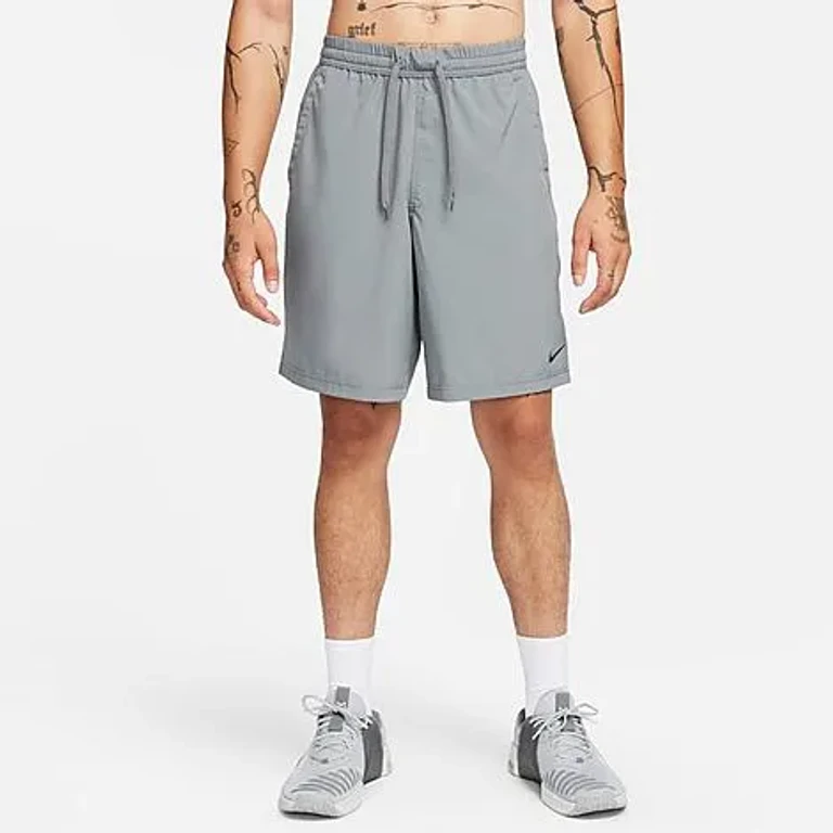 Nike Men's Form Dri-FIT Unlined 9" Versatile Shorts in Black/White Size: XXS