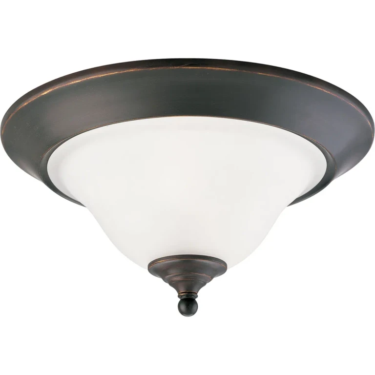 Antique Bronze Two Light Flush Mount from the Trinity Collection