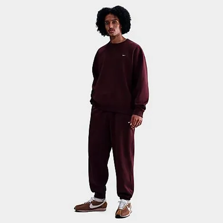 Nike Men's Solo Swoosh Cuffed Fleece Pants in Clay Green/Clay Green/White Size: XS