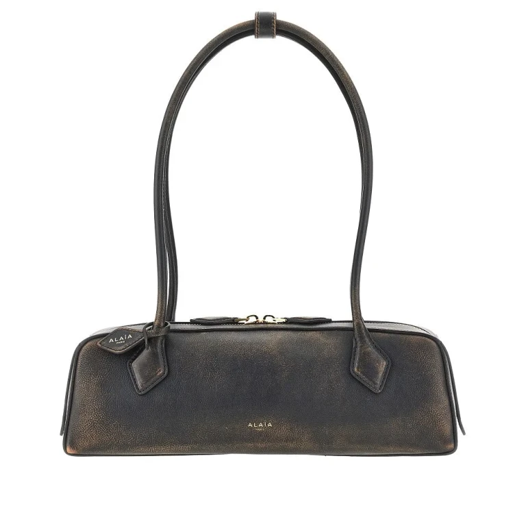 Bolsa média Alaïa Le Teckel em couro com efeito vintage
