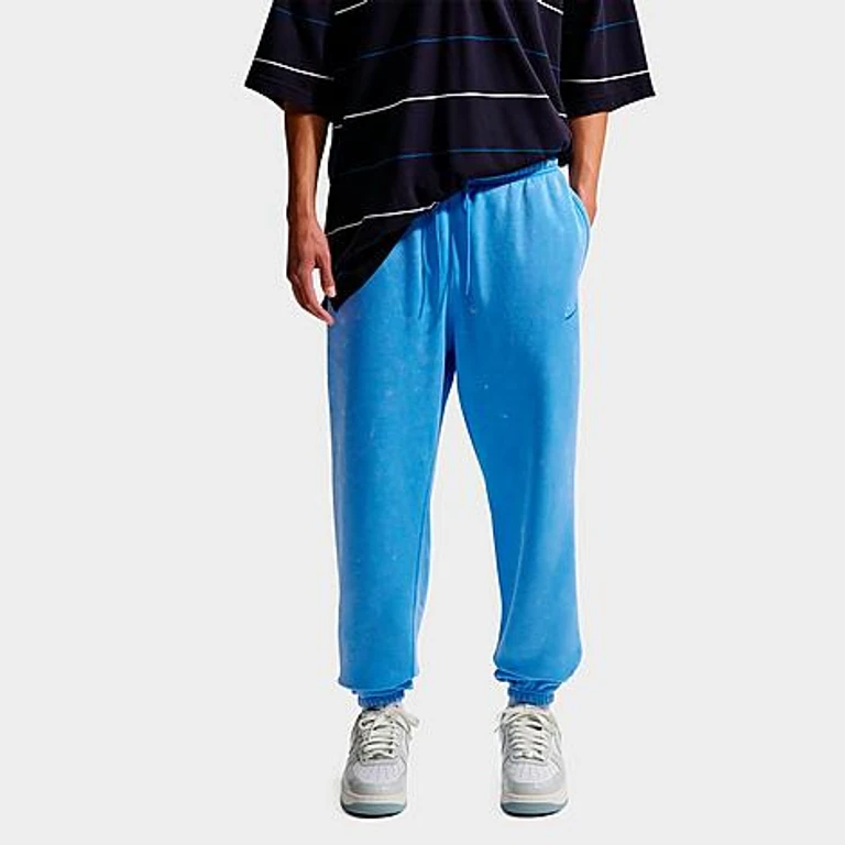 Nike Men's Sportswear Club Washed Cuffed Fleece Pants in University Blue Size: XS