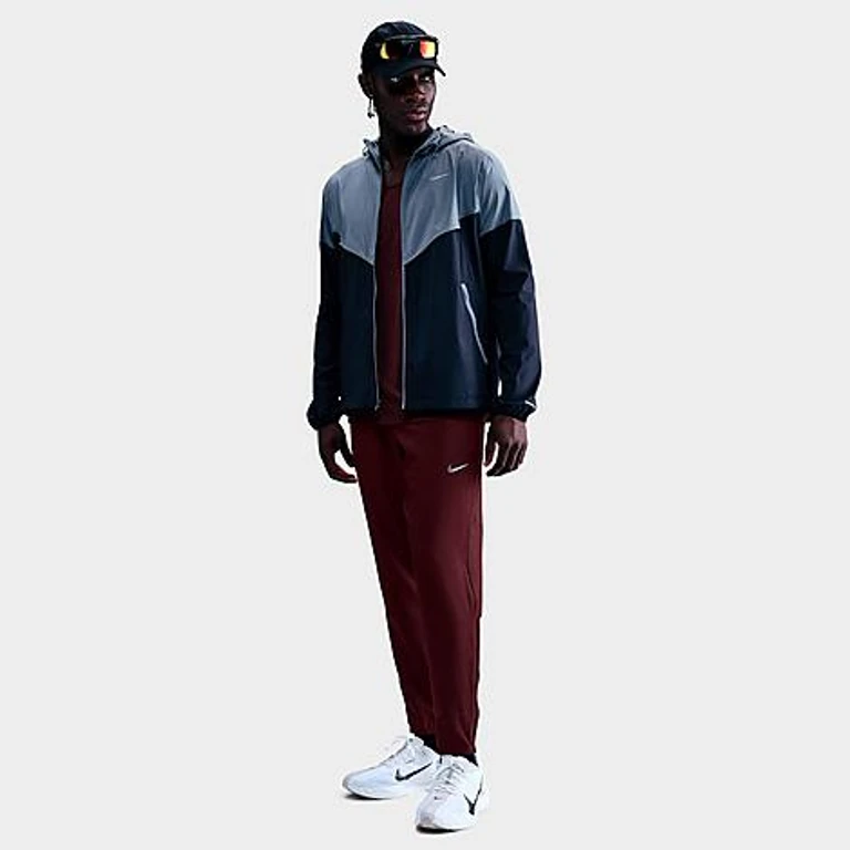 Nike Men's Challenger Dri-FIT Woven Running Pants in World Indigo/Black Size: XS