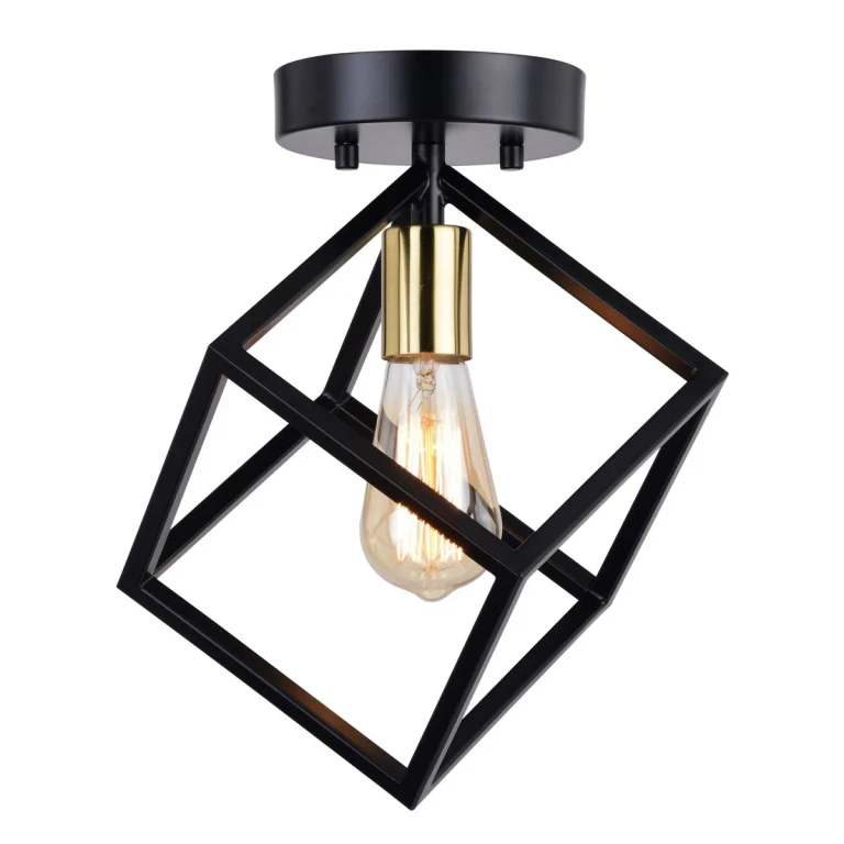 Matte Black and Satin Brass Flush Mount from the Deering Collection