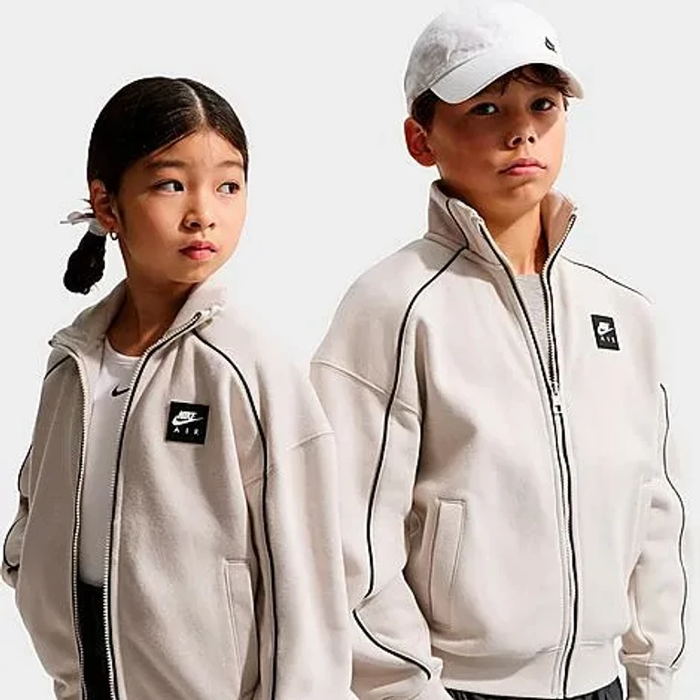 Nike Big Kids Air Fleece Track Jacket in Light Bone/Black Size: XS