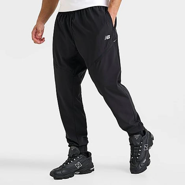 New Balance Men's Woven Zip Pocket Jogger Pants in Black Size: Small