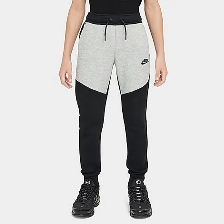 Nike Big Kids Sportswear Tech Fleece Reflective Jogger Pants in Monarch/Black Size: XS