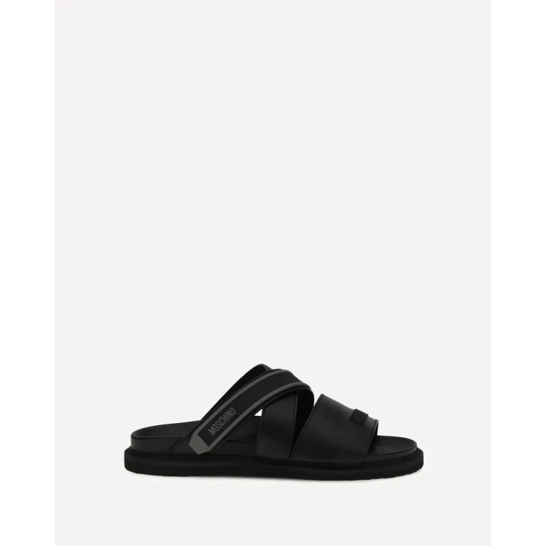 Sandalias planas de piel para hombre Moschino