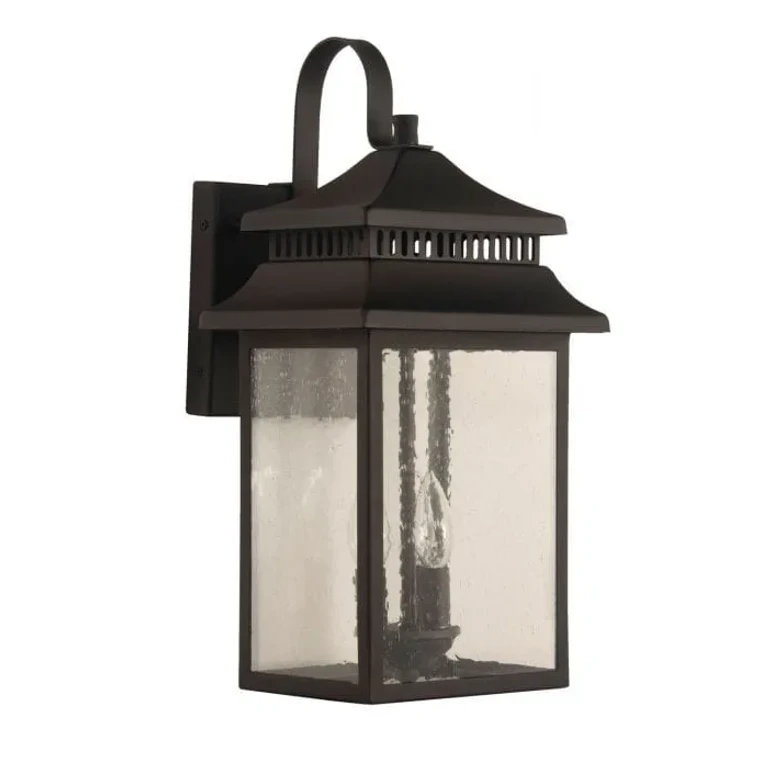 Textured Black Three Light Outdoor Wall Mount from the Crossbend Collection