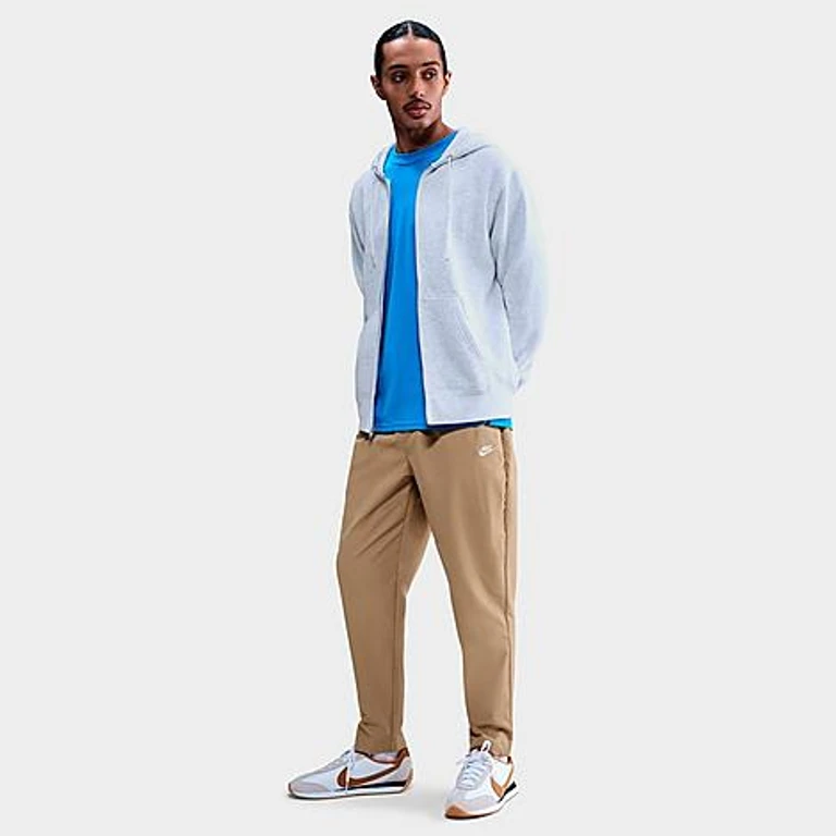 Nike Men's Club Woven Tapered Pants in Parachute Beige/White Size: XS