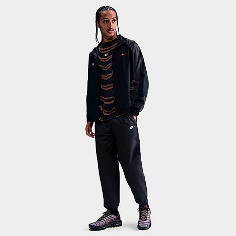 Nike Men's Windrunner Lined Pants in Black/White Size: XS