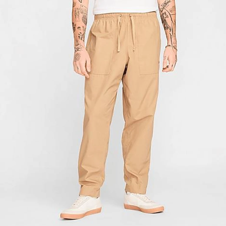 Nike Men's Sportswear Club Barcelona Woven Pants in Parachute Beige/Parachute Beige Size: XS