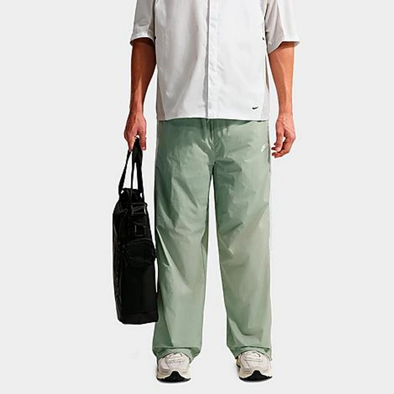 Nike Men's Windrunner Lightweight UV Pants in Jade Horizon/Barely Green/White Size: XS