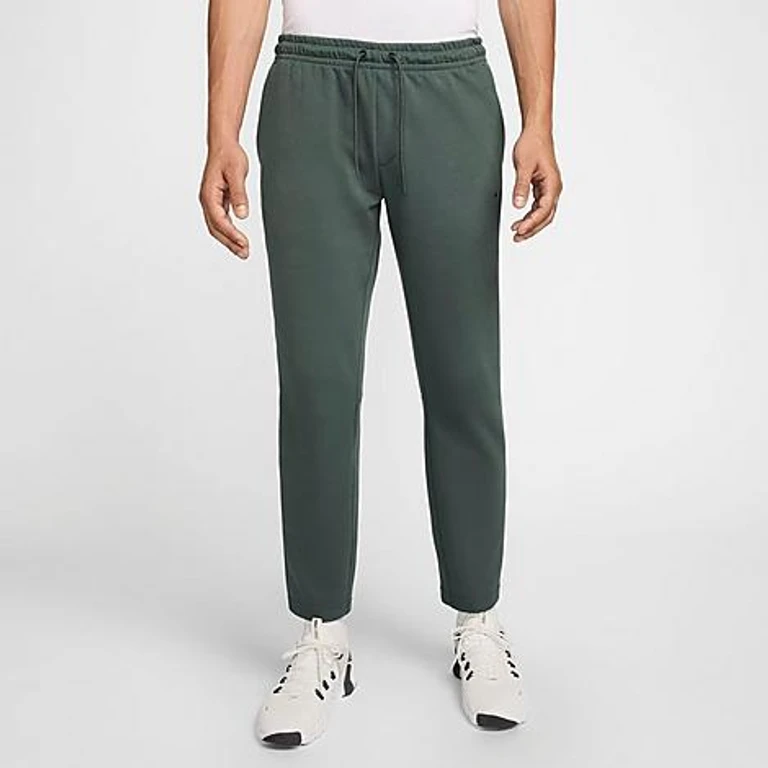 Nike Men's Primary Dri-FIT UV Tapered Versatile Pants in Vintage Green/Vintage Green Size: 2XS