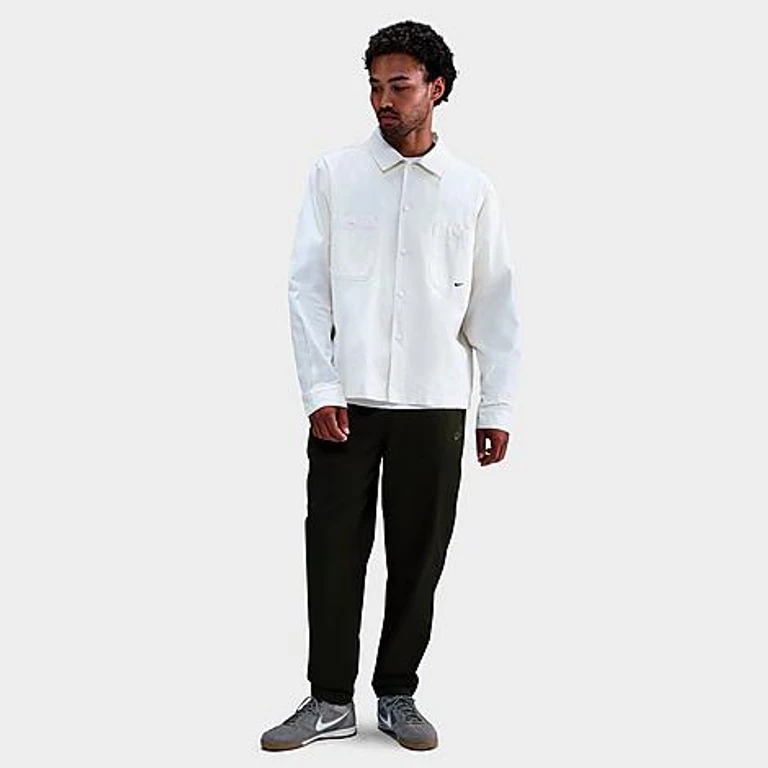 Nike Men's Club Woven Tapered Pants in Sequoia/Sequoia Size: XS