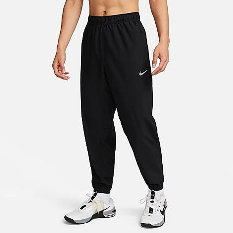 Nike Men's Form Dri-FIT Tapered Versatile Pants in Black/Reflective Silver Size: XS