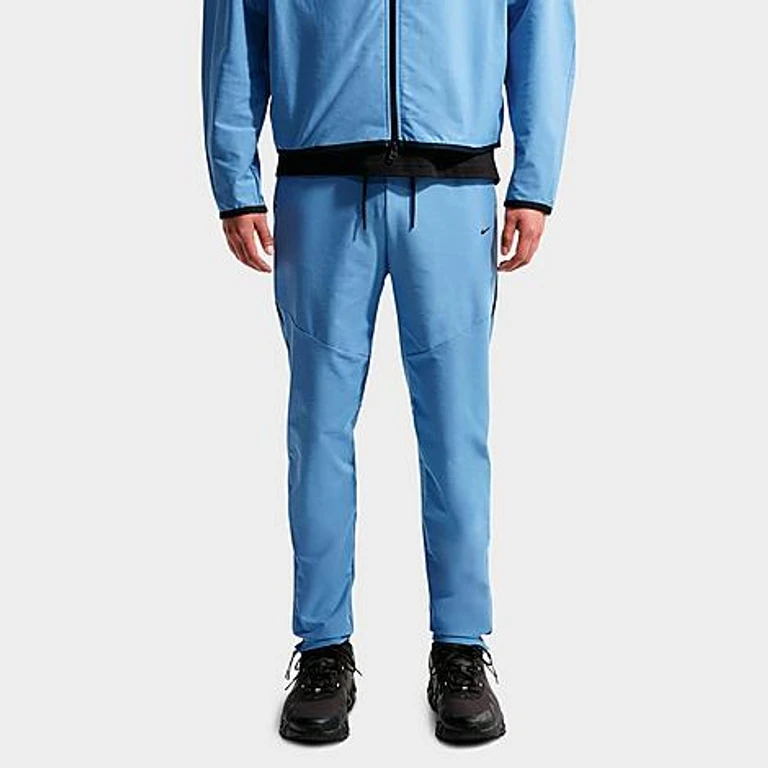 Nike Men's Tech Dri-FIT Shori Knit Pants in Work Blue/Black Size: XS
