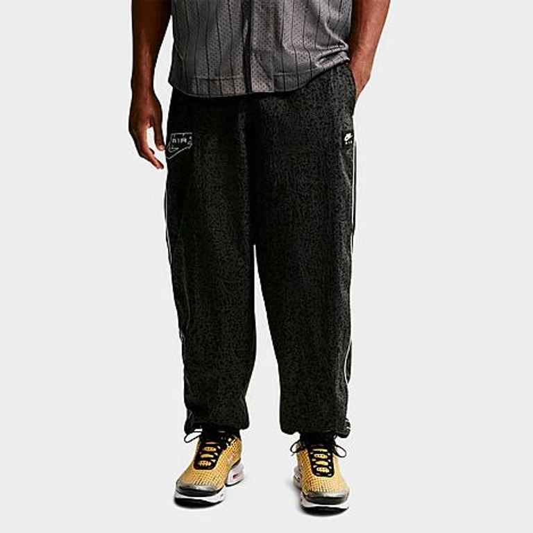 Nike Men's Air Safari Print Woven Pants in Obsidian Size: XS