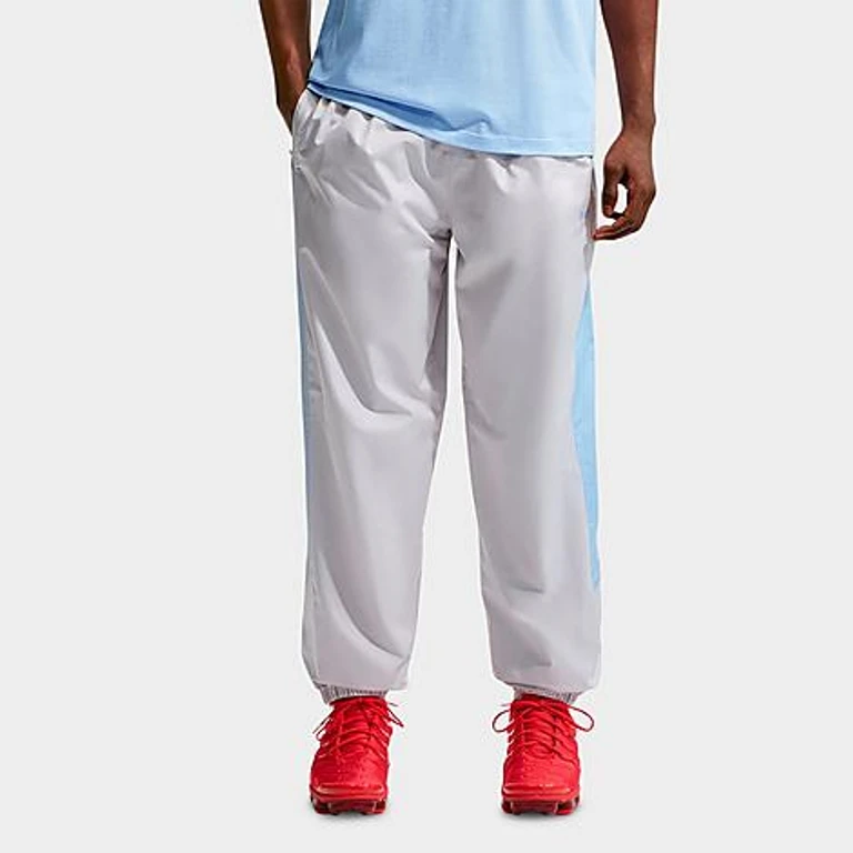 Nike Men's Windrunner Lined Pants in Vast Grey/Hydrogen Blue/Hydrogen Blue Size: XS
