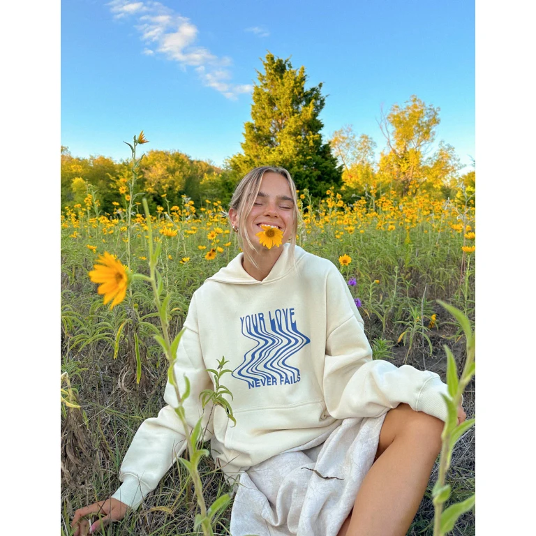 Love Never Fails Cream Unisex Hoodie