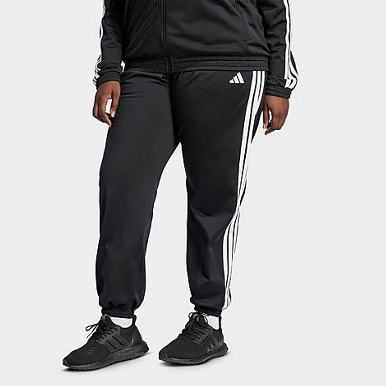 adidas Women's Sportswear Essentials 3-Stripes Tricot Tracksuit Pants (Plus Size) in Black/White Size: 1X