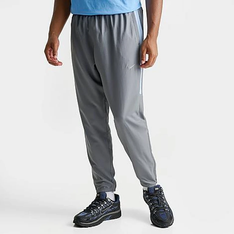 Nike Men's Challenger Dri-FIT Woven Running Pants in Cool Grey/Psychic Blue Size: Small