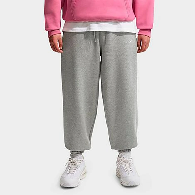 Nike Men's Solo Swoosh Cuffed Sweatpants in Dark Grey Heather/Sail Size: Small