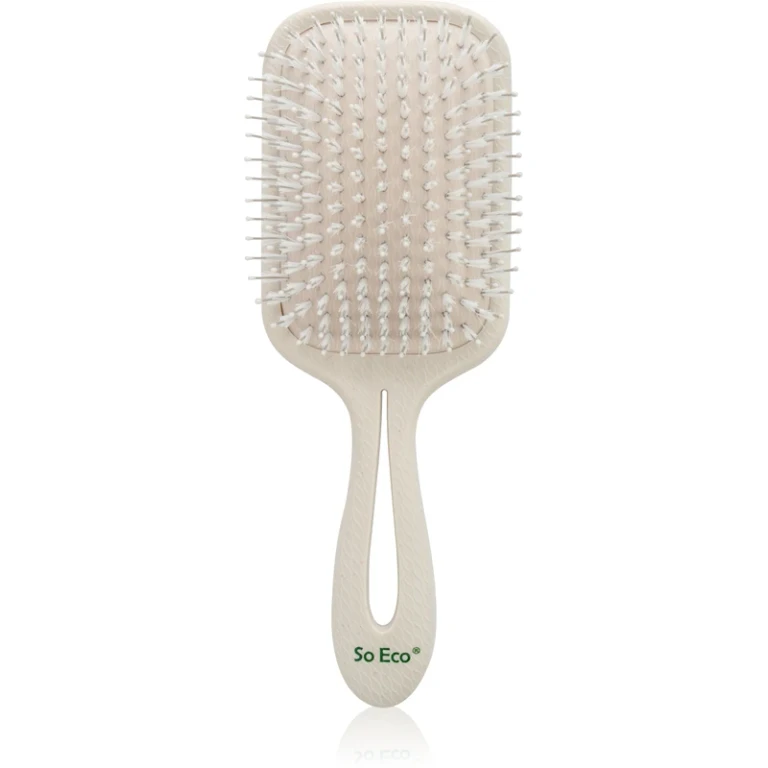 Paddle hairbrush with nylon fabrics
