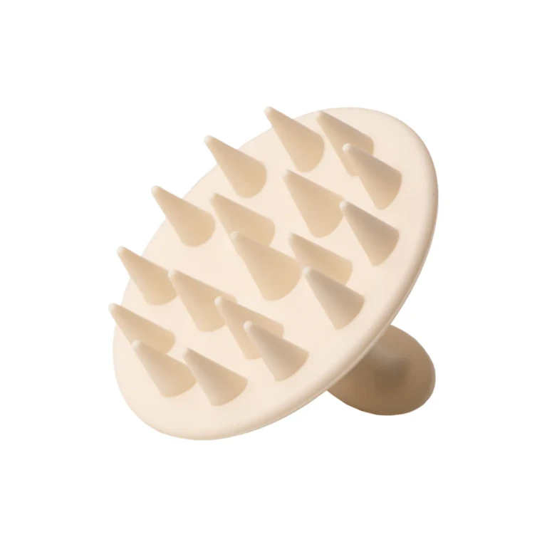 Exfoliating hair brush