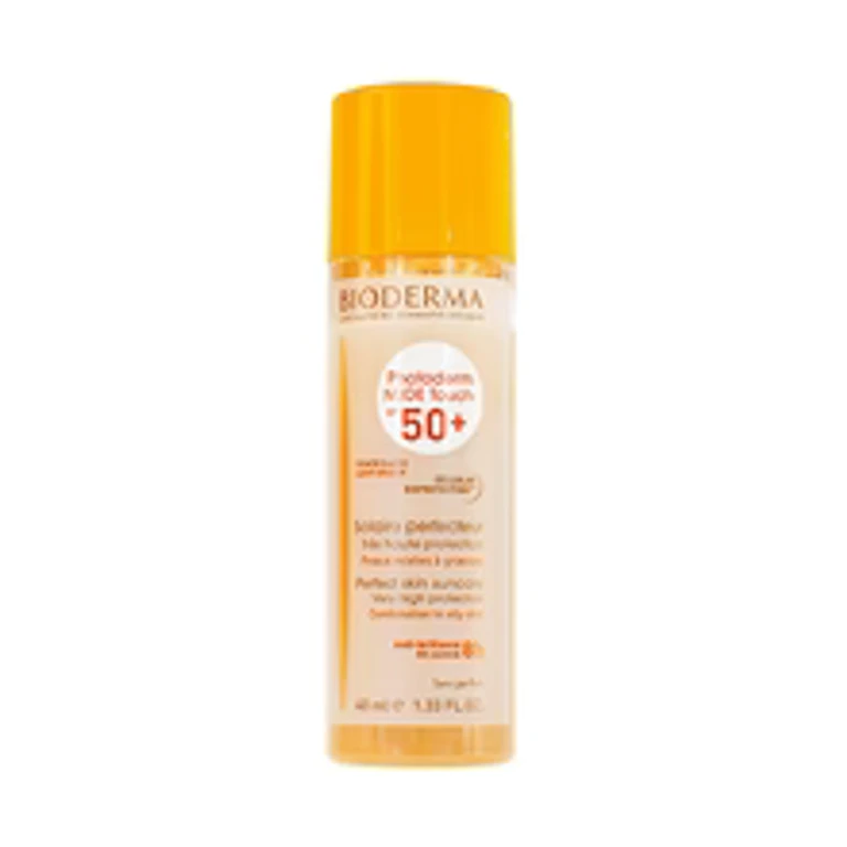 Photoderm Nude SPF 50+ - Toning protective fluid for combination to oily skin - 40 ml