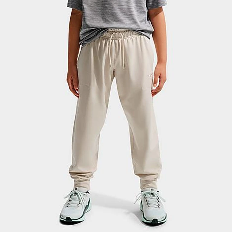 Nike Big Kids Primary Nanoknit Dri-FIT UV Protection Jogger Pants in Light Orewood Brown/Sail/Heather Size: XS
