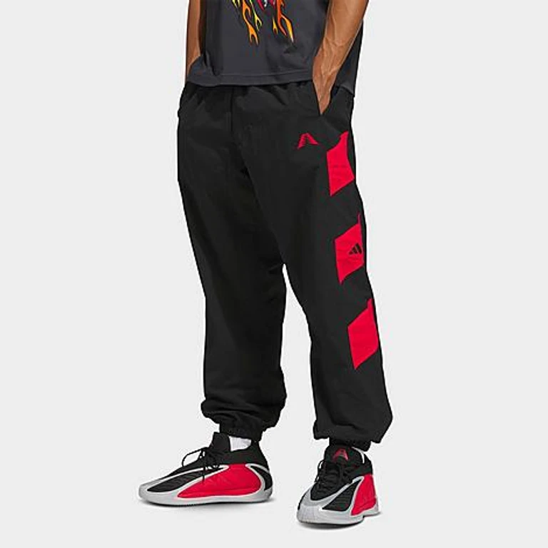 Men's Anthony Edwards Foundation Track Pants in Black/Pure Ruby Size: XS