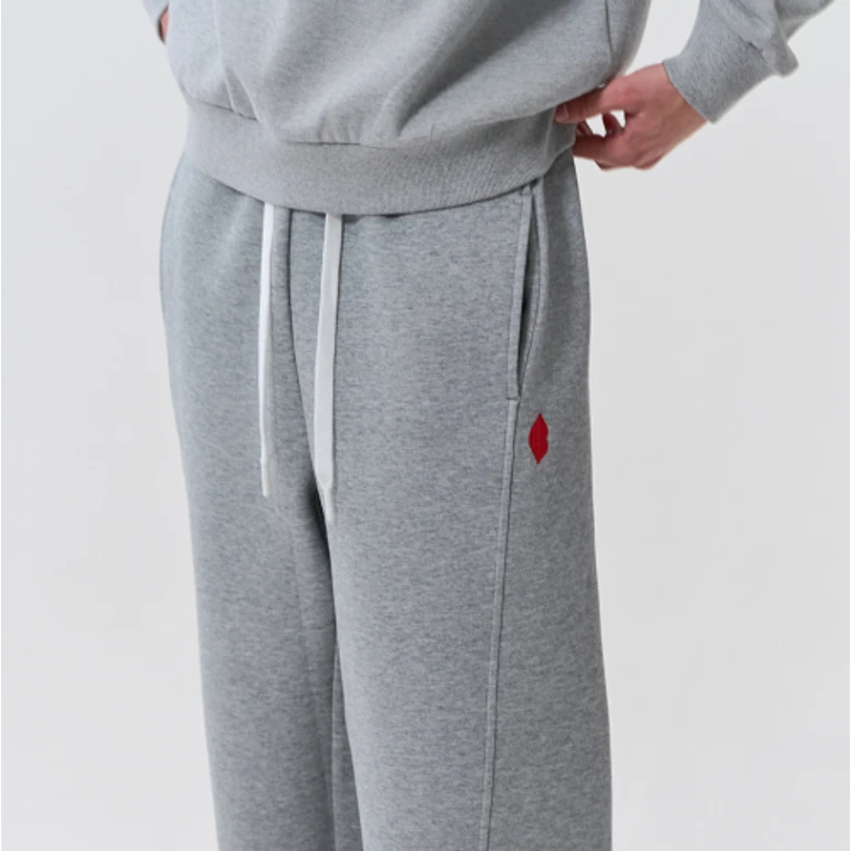 LIP LINE POCKET SWEAT PANTS