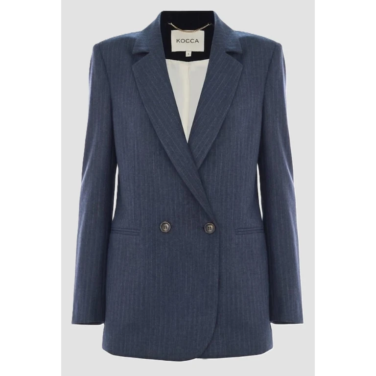 grey jacket woman blue night