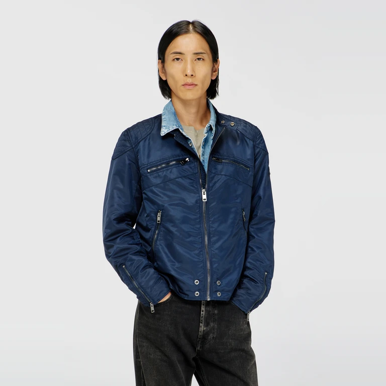 Nylon jacket with quilted shoulders and zip pockets - Jackets - Man - Blue